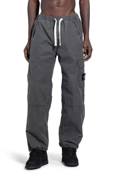 Stone Island Logo Patch Drawstring Pants In Grey