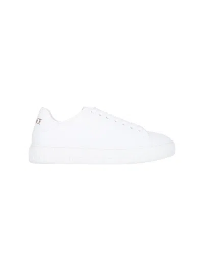 Shop Versace Sneakers In White