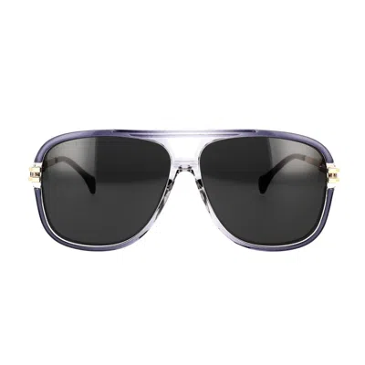 Shop Gucci Eyewear Sunglasses In Gold