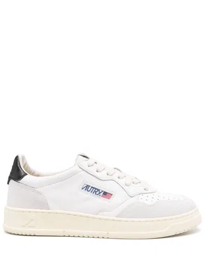 Shop Autry Sneakers In White