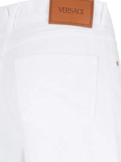 Versace 'medusa '95' Denim Trousers In White