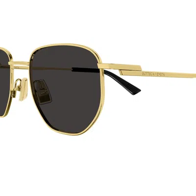 Shop Bottega Veneta Sunglasses In Gold