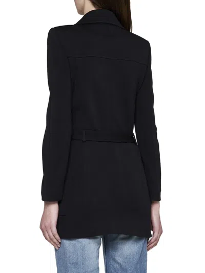 Shop Saint Laurent Coats In Black