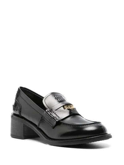 Shop Miu Miu Brushed Leather Penny Loafers In Black