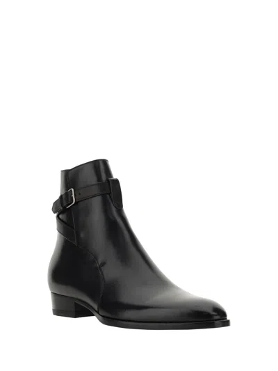 Shop Saint Laurent Boots In Black