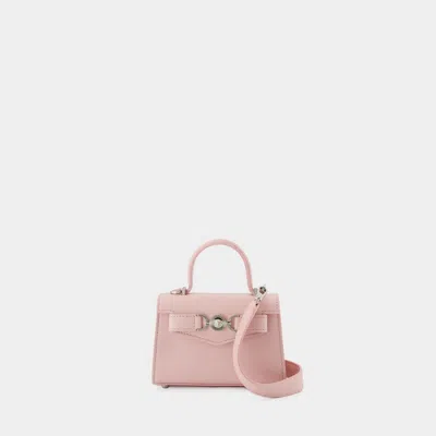 Shop Versace Mini Medusa 95 Crossbody In Pink