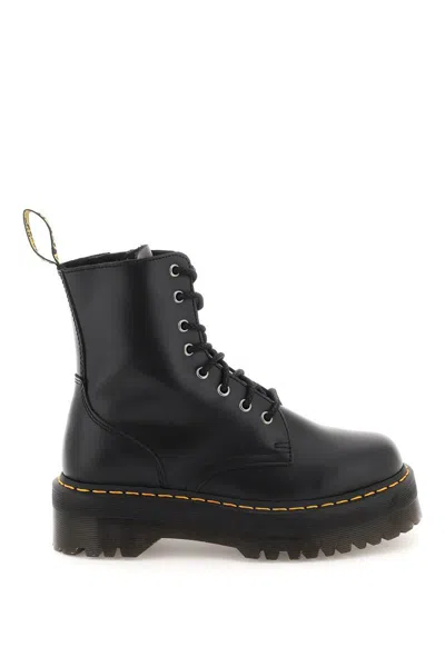 Dr. Martens' Platform Boots With Treaded Sole And Distinctive Accents In Black