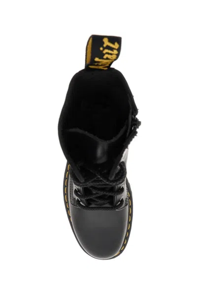 Dr. Martens' Platform Boots With Treaded Sole And Distinctive Accents In Black