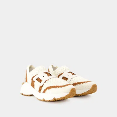 Shop Tod's Sport Run Sneakers In Beige