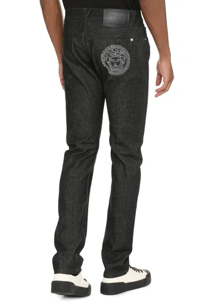 Shop Versace 5-pocket Slim Fit Jeans In Black