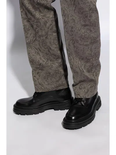 Versace Chunky Sole Ankle-high Boots With Round Toe In Black