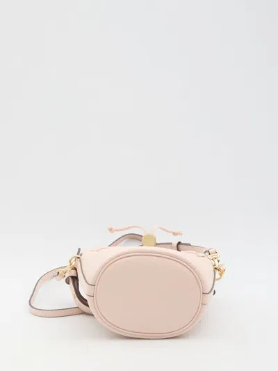 Shop Tory Burch T Monogram Mini Bucket Bag In Pink