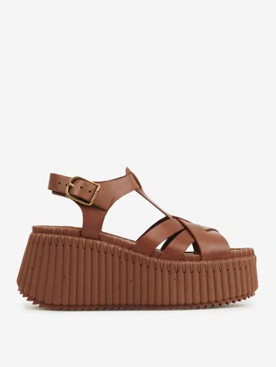 Shop Chloé Nama Leather Wedges In Interlocking Straps Combined With Tone-on-tone Stitching