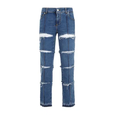 Alexander Mcqueen Low-rise Distressed Jeans In Blue