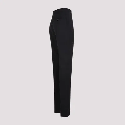Alexander Mcqueen Wool Flared Pants In Black