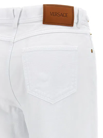 Versace Medusa Flared Jeans In White