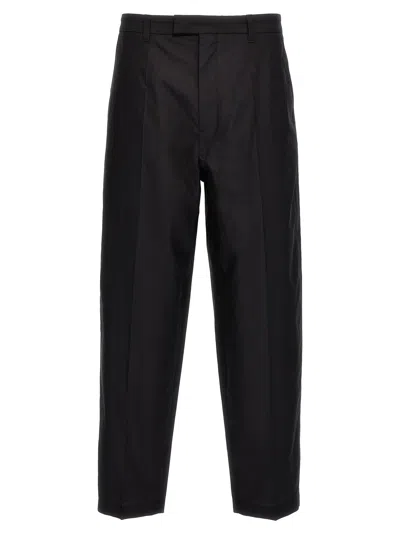 Shop Lemaire 'carrot' Trousers In 黑色的