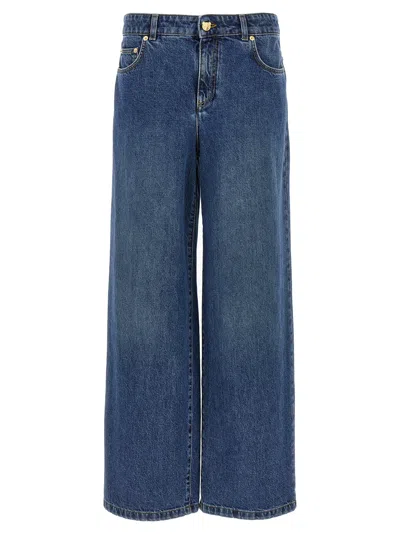 Shop Moschino Denim Jeans In Blue