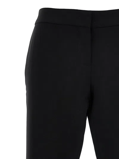 Moschino Flared High Waist Trousers With Front Crease In Black