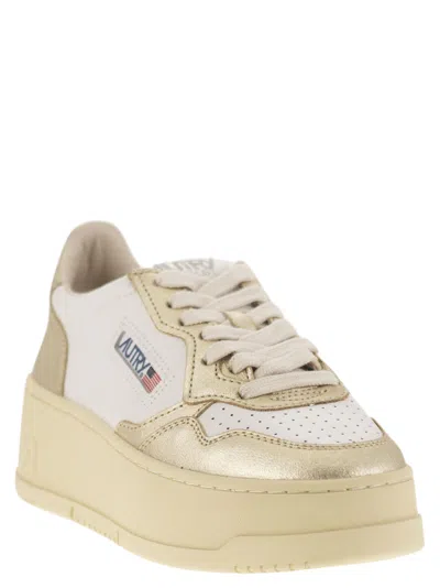Autry Platform Low-top Sneakers With Platform Sole In Gold
