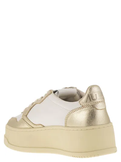 Autry Platform Low-top Sneakers With Platform Sole In Gold