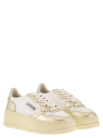 Autry Platform Low-top Sneakers With Platform Sole In Gold