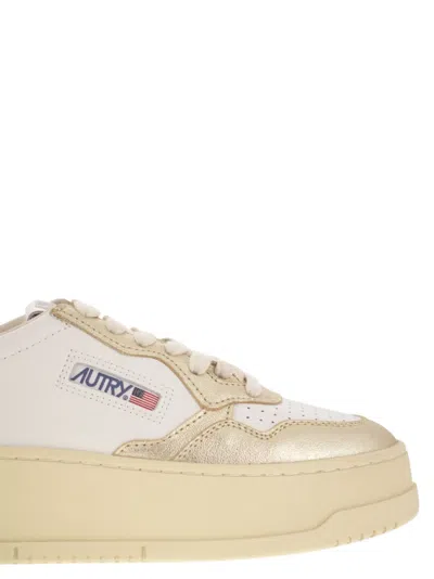 Autry Platform Low-top Sneakers With Platform Sole In Gold