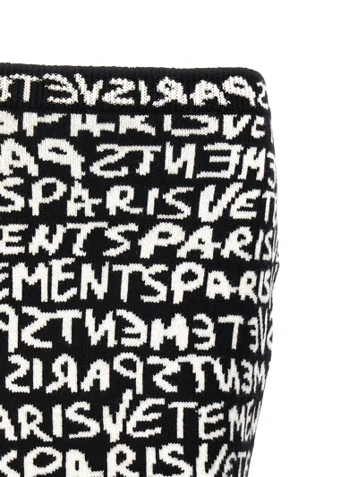 Vetements Paris Monogram High-waisted Mini Skirt In White/black