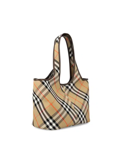 Shop Burberry Handbags In Beige