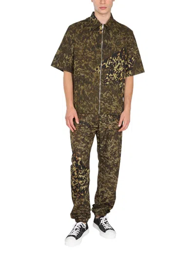 Givenchy 4g Print Trousers In Green
