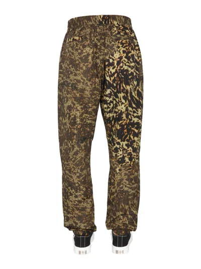 Givenchy 4g Print Trousers In Green