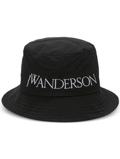 Jw Anderson J. W.anderson Solid Color Bucket Hat With Embroidered Logo In Black