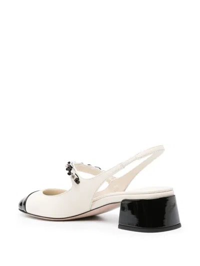 Miu Miu Embellished Leather Slingback Pumps In Avorio+nero