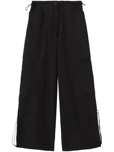 Palm Angels Wide-leg Nylon Parachute Pants With Adjustable Cuffs In Black