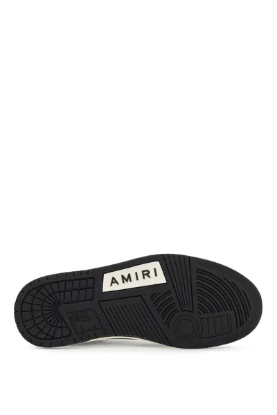 Shop Amiri Skel Top Low Sneakers