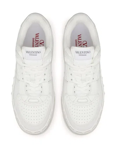 Shop Valentino Garavani Sneakers In White