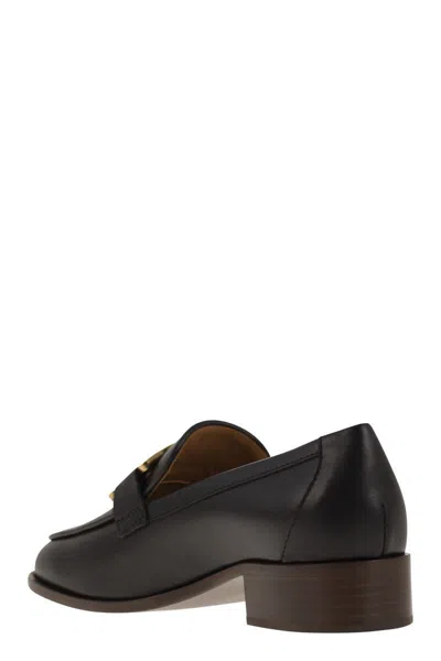 Shop Tod's Leather Loafer In Black