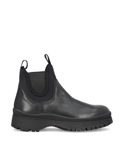 Prada Chunky Sole Leather Ankle Boots In Black