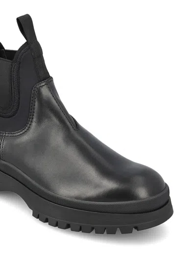 Prada Chunky Sole Leather Ankle Boots In Black