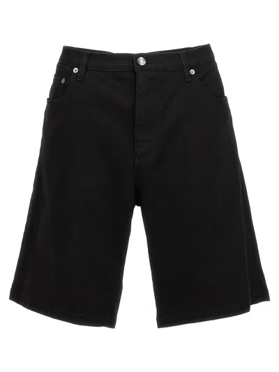 Shop Dolce & Gabbana Stretch Denim Bermuda Shorts In Black