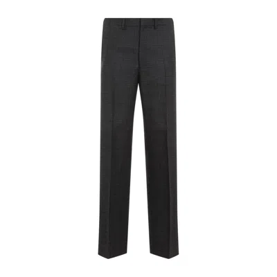 Prada Prince Of Wales Checked Wool Trousers In Grey