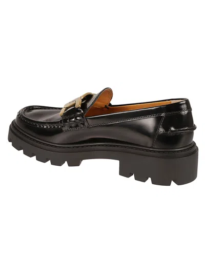 Shop Tod's Flat Shoes Black