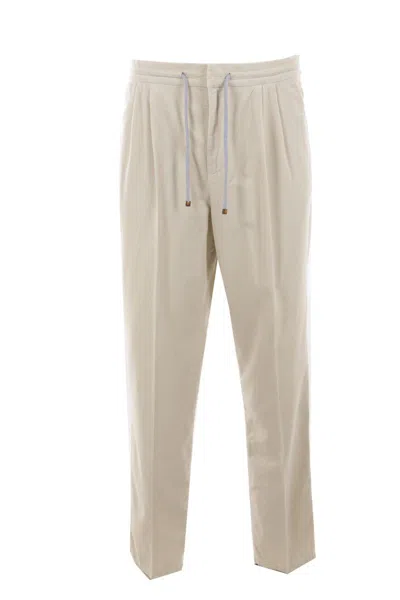 Shop Brunello Cucinelli Trousers In Limestone