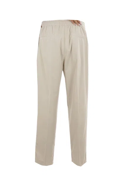 Shop Brunello Cucinelli Trousers In Limestone