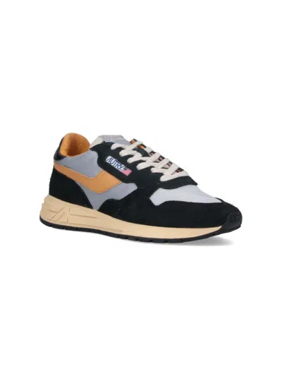 Autry Low Sneaker With Contrast Stitching And Mesh Panels In Black