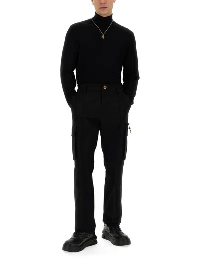 Shop Versace Cargo Pants In Black