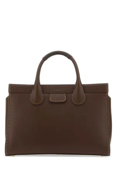 Shop Chloé Handbags. In Brown