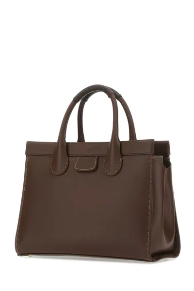 Shop Chloé Handbags. In Brown