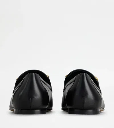 Shop Tod's Flat Shoes In Black