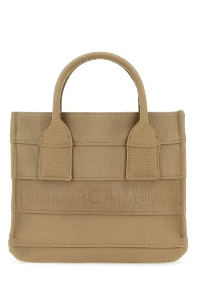 Shop Ferragamo Salvatore  Handbags. In Beige